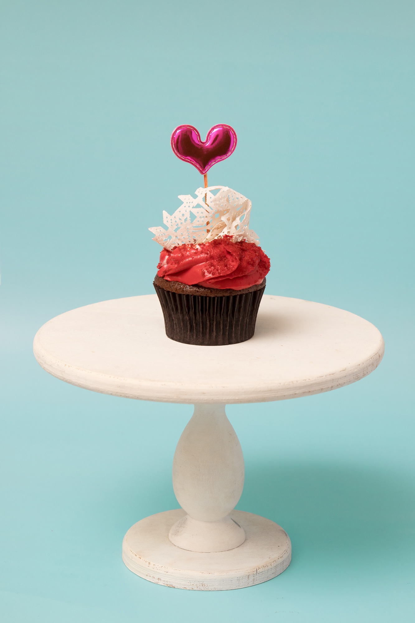 Cupcake with heart shape decor sweets for Valentine's Day party or menu